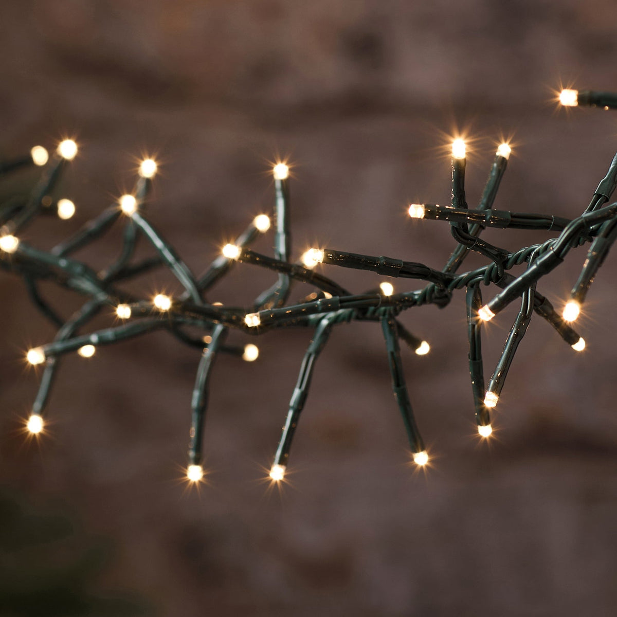 10m 1000 LED Warm White Outdoor Cluster Fairy Lights on Green Cable